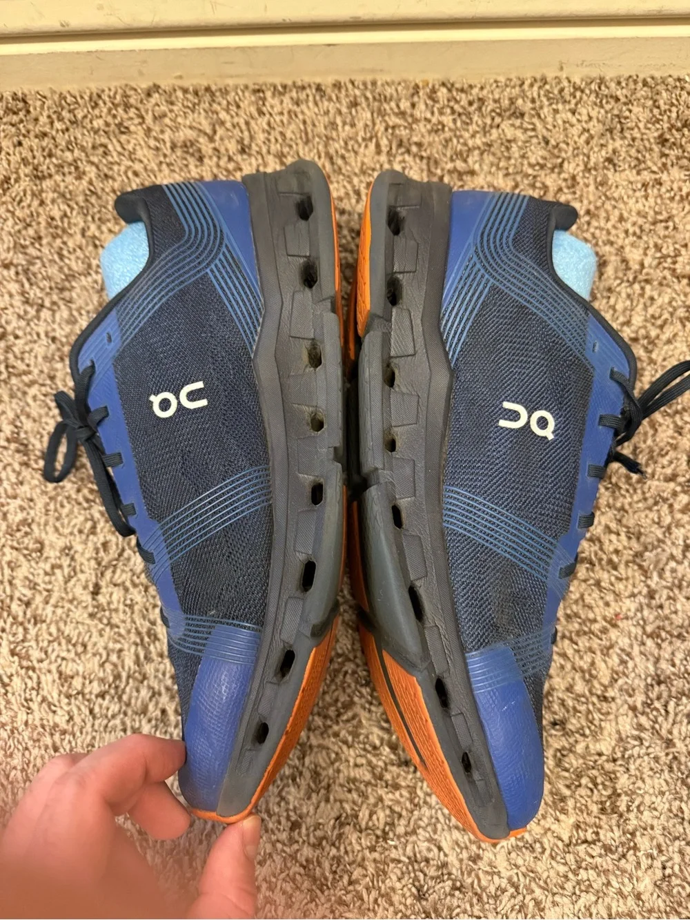 On Running Men’s Navy and Black Cloudtec Trainer with Orange Accents